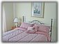 Master Bedroom with a king size bed 