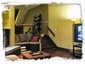 Sunken living room w/Fireplace & 62" HDTV