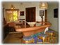 The open plan kitchen with full amenities and beautiful artistic touches.
