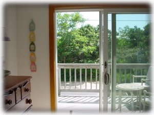 2nd bedroom leads out to front deck