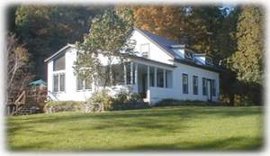 The Farm, deck overlooking river at back.