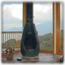 Fabulous Corner Fireplace surrounded by windows really lets in the View