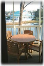 20 foot wide screened in porch over looking lake