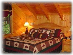 king sized bed in loft area