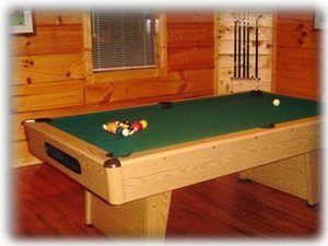 downstairs area includes a pool table and tv