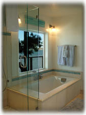 master bath and shower with harbor views
