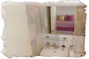 Modern Marble Bathroom with Full Bathtub and Plenty of Hot Water