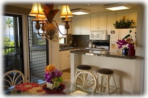 Spacious gourmet kitchen with two convenient bar stools