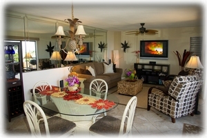 Living room and Dining area inside or out on the Lanai with a view of the ocean