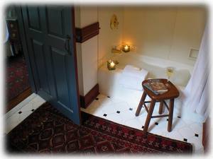 The Cottage bathroom has a combination tub/shower.