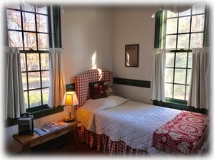 A twin-size bed in the Tavern Room provides extra sleeping space.