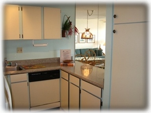 Kitchen has pantry and view into Living / Dining area