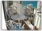 Bistro set on terrace seats 2