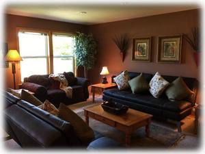 Comfortable downstairs with futons and pool table; great for the kids!