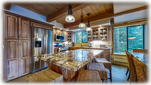 Fully Stocked Gourmet kitchen, gas cooking, pantry and granite service island