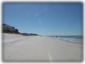 Looking south down thw white sand beach of Cape San Blas.