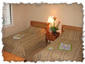 Guest Bedroom with Private Bath Access and Flexible Twin Beds