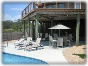 Another shot of the pool deck showing some more of the furniture