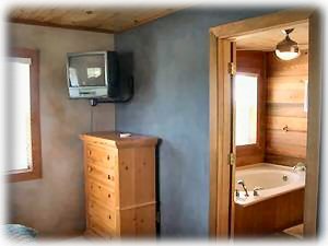 The master bath TV and bathroom.