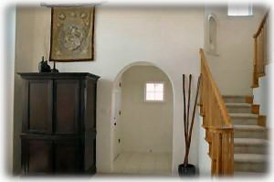 View of entrway and stairs leading up to the master suite