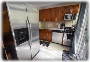 Remodeled Kitchen with Granite Countertops 