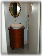 Half Bathroom with Marble Floor in the Suite