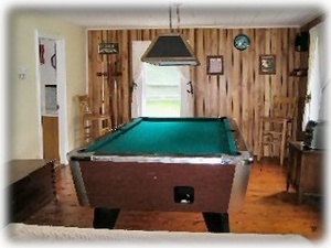 This Jay Peak vacation rental has a pool table.