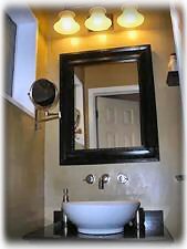 Master Bath w/vessel sink, slate shower and Jetted Tub. 