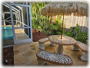 Another Outdoor Seating Area with Lovely Pool View