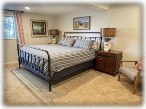 Upstairs bedroom: King bed with treetop views