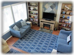 View of living area from top of stairs