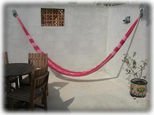 Hammocks and outdoor seating in private courtyard