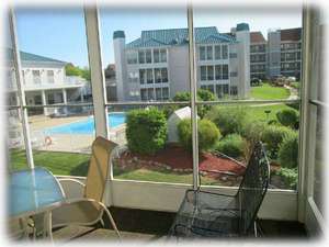 View one of the pools from the porch. Seats 6.