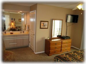 Master bedroom- dual sinks separate from the stool & jetted tub.