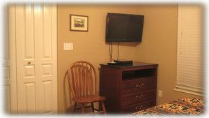 The guest bedroom has a 32" HDTV too.