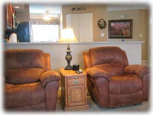 Two rocking recliners. Comforts of home