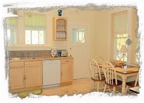 Spacious kitchen offering modern conveniences and dining space!