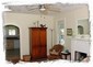 Expansive living room with original historic charm and features! 