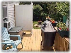 Deck area with enclosed outdoor shower