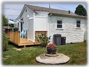 Rear of house, deck, enclosed outdoor shower