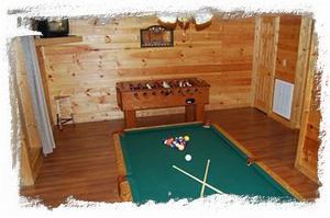 Game Room with Slate Pool Table and Foosball Table