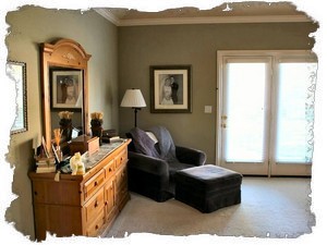 Master Bedroom Sitting Area with French Doors Leading Out to Backyard Patio