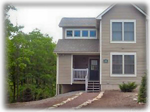 Front of townhouse with porch and storage closet, for ski equipment!