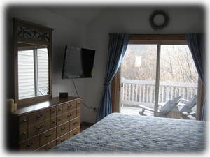 Master Bedroom with King Bed and Flat Screen TV