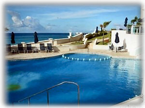 The huge outdoor pool with jacuzzi