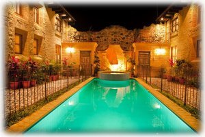 The pool lit up at night. 