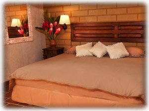 Another shot of the master bedroom with the king-sized beds. 