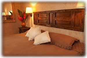 Our wooden headboards throughout our home add a classic touch. 