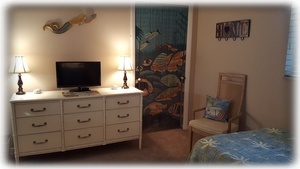 "Bahamas" Bedroom with Closet Containing Same Items as "Hawaii" Bedroom Closet