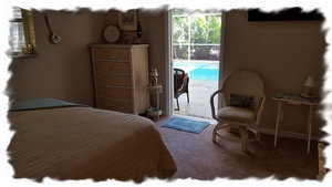 "Hawaii" Bedroom with Private Entrance to Screened-In Patio